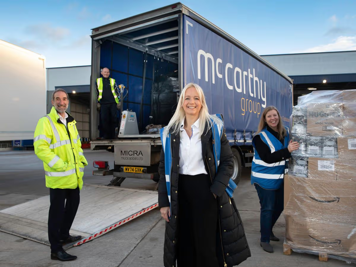 Caroline Platt, MD of Platts Group with (L/R) McCarthy Group's MD Mike McCarthy, McCarthy driver Phil Sharrock and chief officer at AVOW in Wrexham Dawn Roberts-McCabe. Photo: Mandy Jones